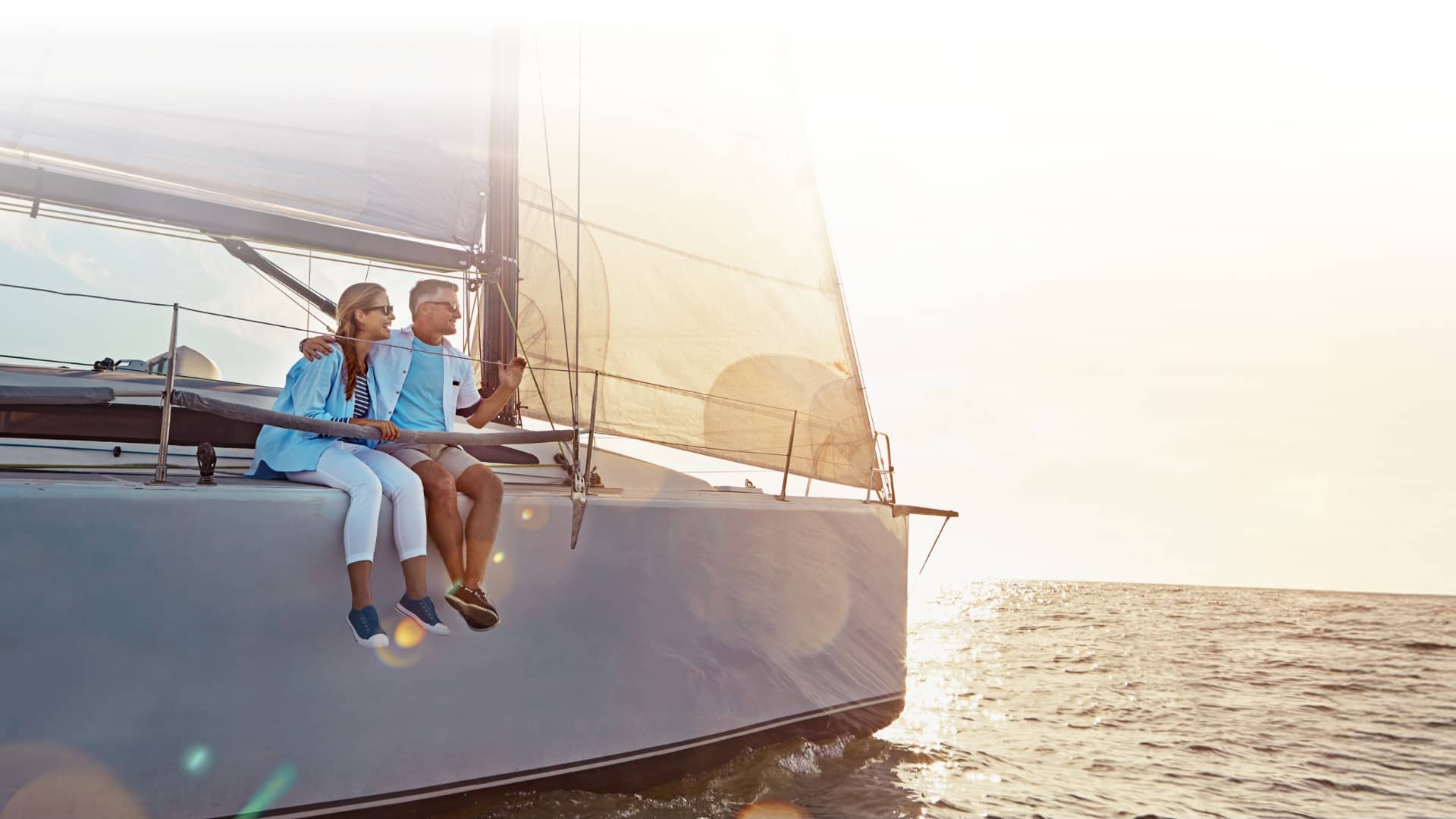 Photo: Man and woman enjoying life on a boat